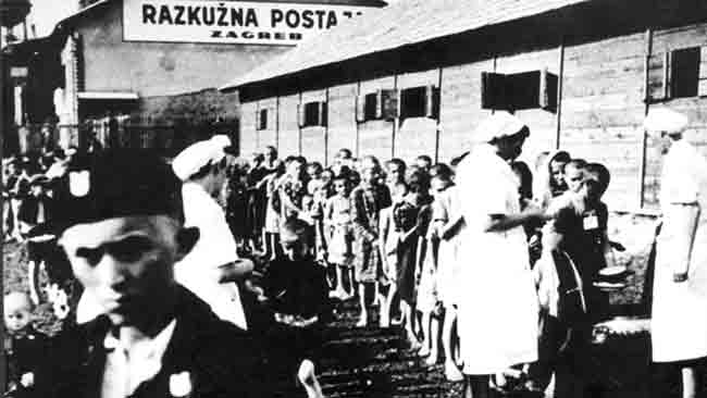 „Раскужна постаја Загреб“ - транзирни логор за децу и одабир будућих малих усташких јаничара Фото: ЈУ Јасеновац - Доња Градина „Раскужна постаја Загреб“ - транзирни логор за децу и одабир будућих малих усташких јаничара Фото: ЈУ Јасеновац - Доња Градина